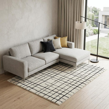 7' X 10' Cream and Black Abstract Distressed Area Rug