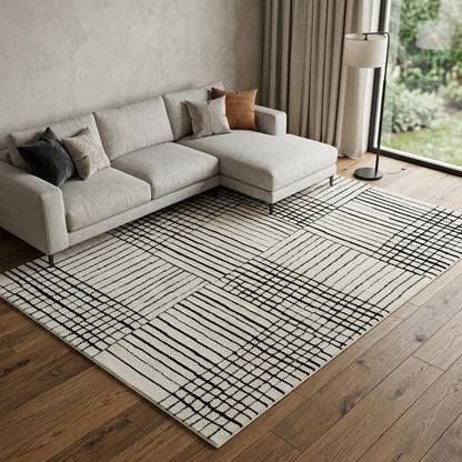 8' X 11' Cream and Black Abstract Distressed Area Rug