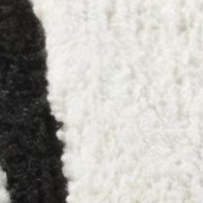 4' X 6' Cream and Black Abstract Distressed Area Rug