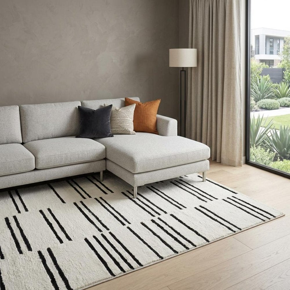 7' X 10' Cream and Black Abstract Distressed Area Rug