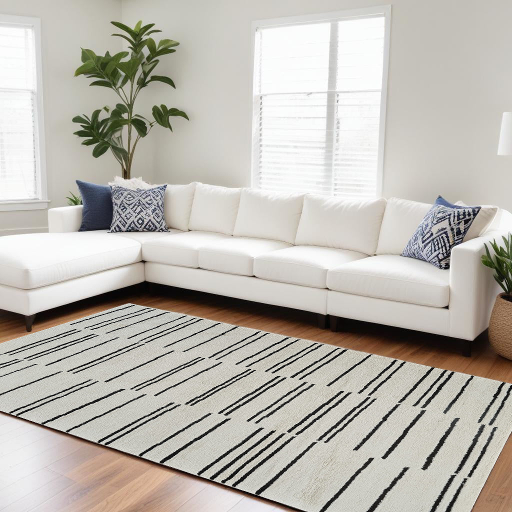 7' X 10' Cream and Black Abstract Distressed Area Rug