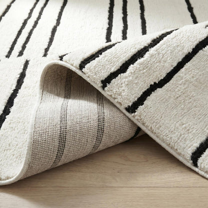 7' X 10' Cream and Black Abstract Distressed Area Rug