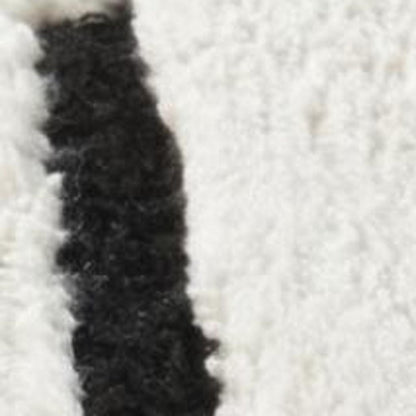7' X 10' Cream and Black Abstract Distressed Area Rug