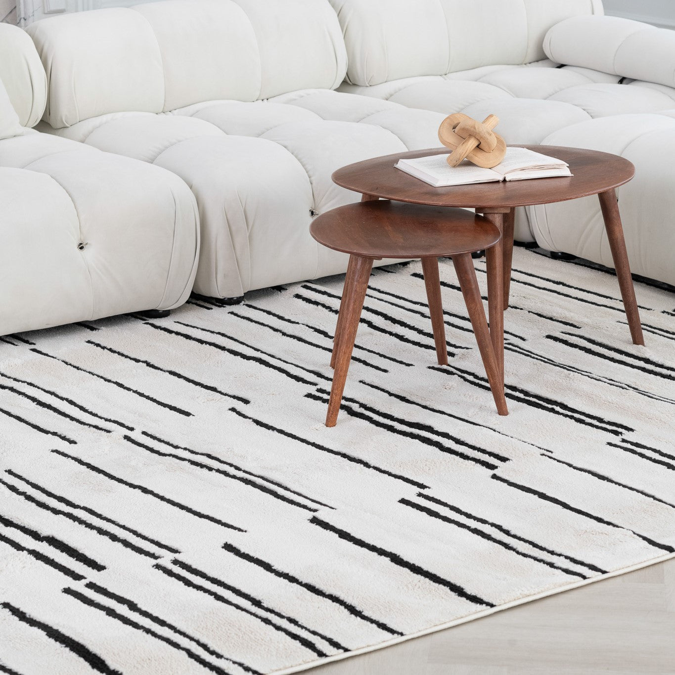 7' X 10' Cream and Black Abstract Distressed Area Rug