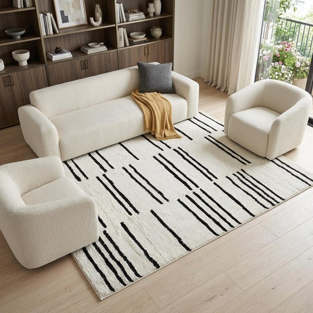 8' X 11' Cream and Black Abstract Distressed Area Rug