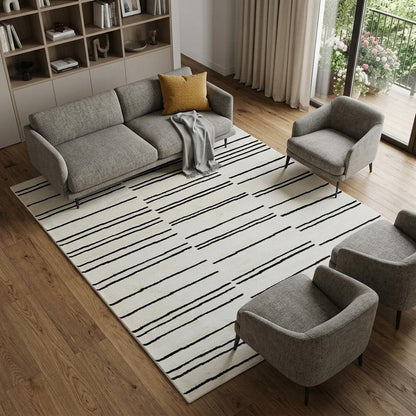 8' X 11' Cream and Black Abstract Distressed Area Rug