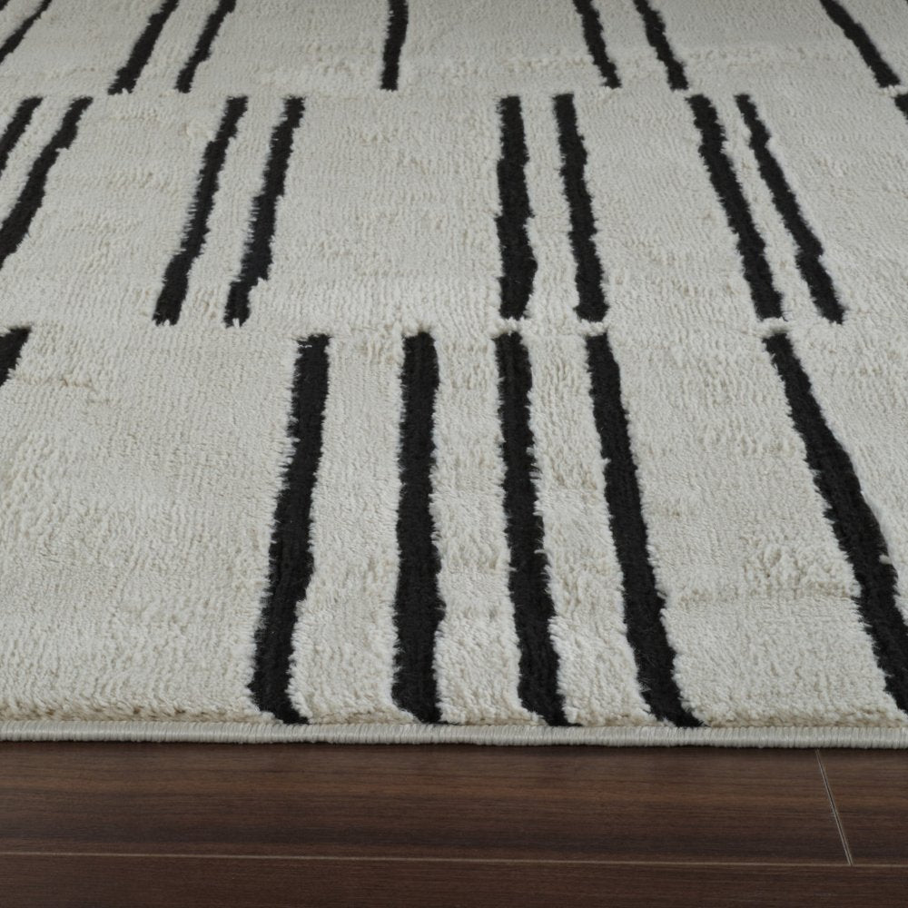 8' X 11' Cream and Black Abstract Distressed Area Rug
