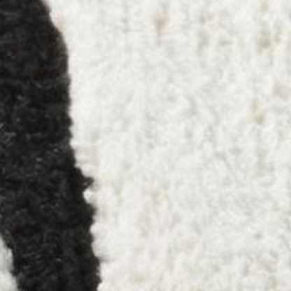 8' X 11' Cream and Black Abstract Distressed Area Rug