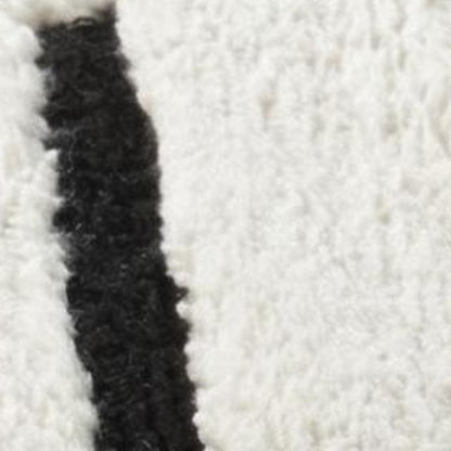 8' X 11' Cream and Black Abstract Distressed Area Rug