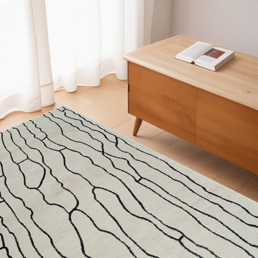 4' X 6' Cream and Black Abstract Distressed Area Rug