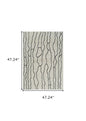4' X 6' Cream and Black Abstract Distressed Area Rug