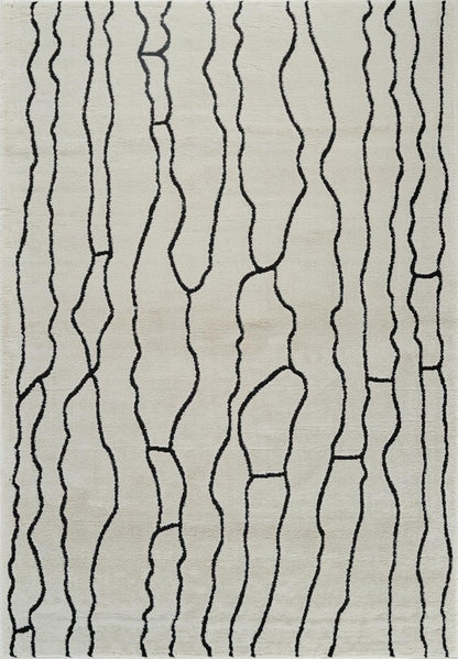 4' X 6' Cream and Black Abstract Distressed Area Rug