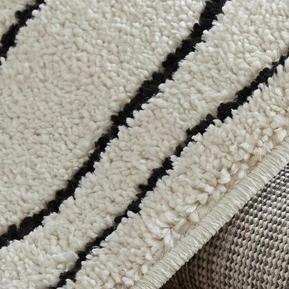 4' X 6' Cream and Black Abstract Distressed Area Rug