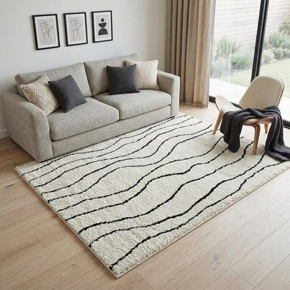 5' X 8' Cream and Black Abstract Distressed Area Rug