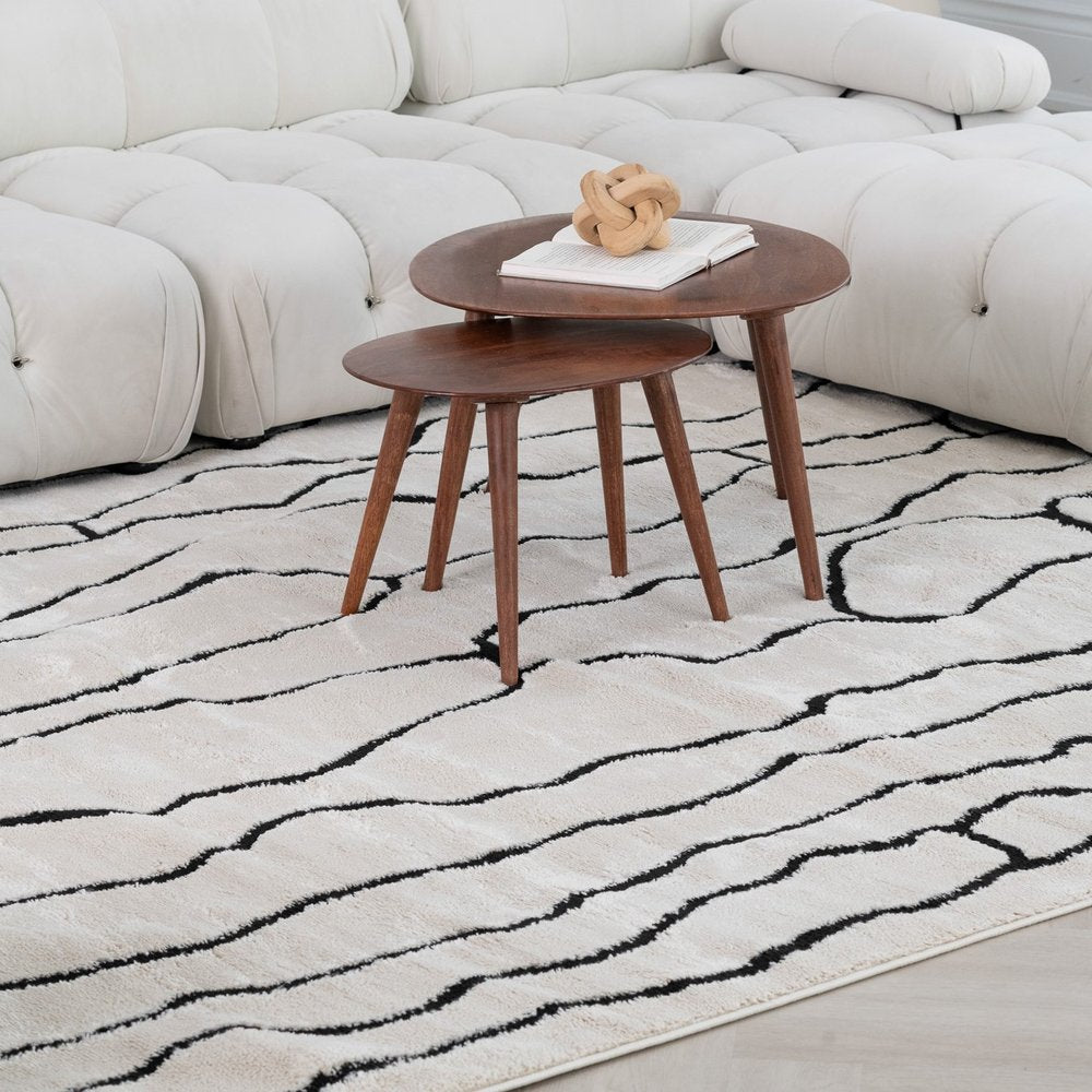 7' X 10' Cream and Black Abstract Distressed Area Rug