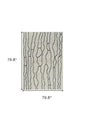 7' X 10' Cream and Black Abstract Distressed Area Rug