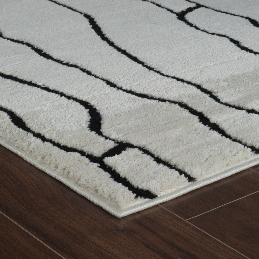 7' X 10' Cream and Black Abstract Distressed Area Rug