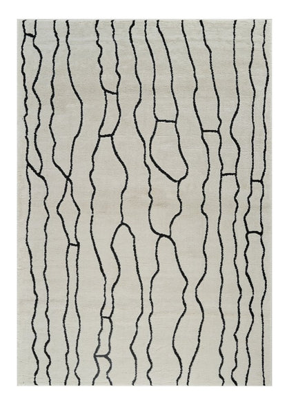 7' X 10' Cream and Black Abstract Distressed Area Rug