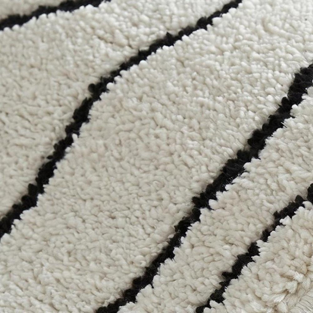 7' X 10' Cream and Black Abstract Distressed Area Rug