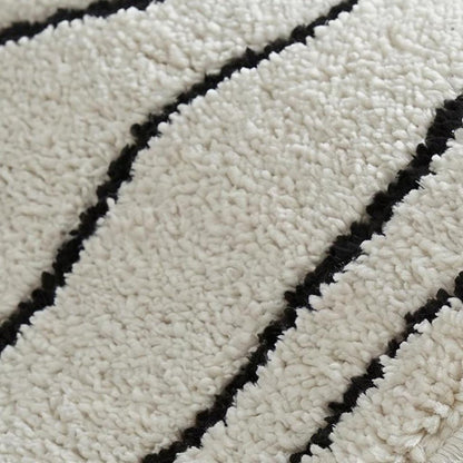 7' X 10' Cream and Black Abstract Distressed Area Rug
