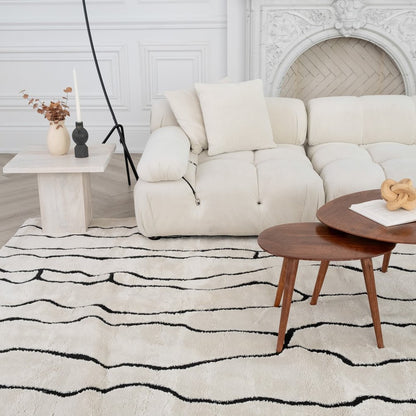 7' X 10' Cream and Black Abstract Distressed Area Rug