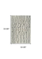8' X 11' Cream and Black Abstract Distressed Area Rug