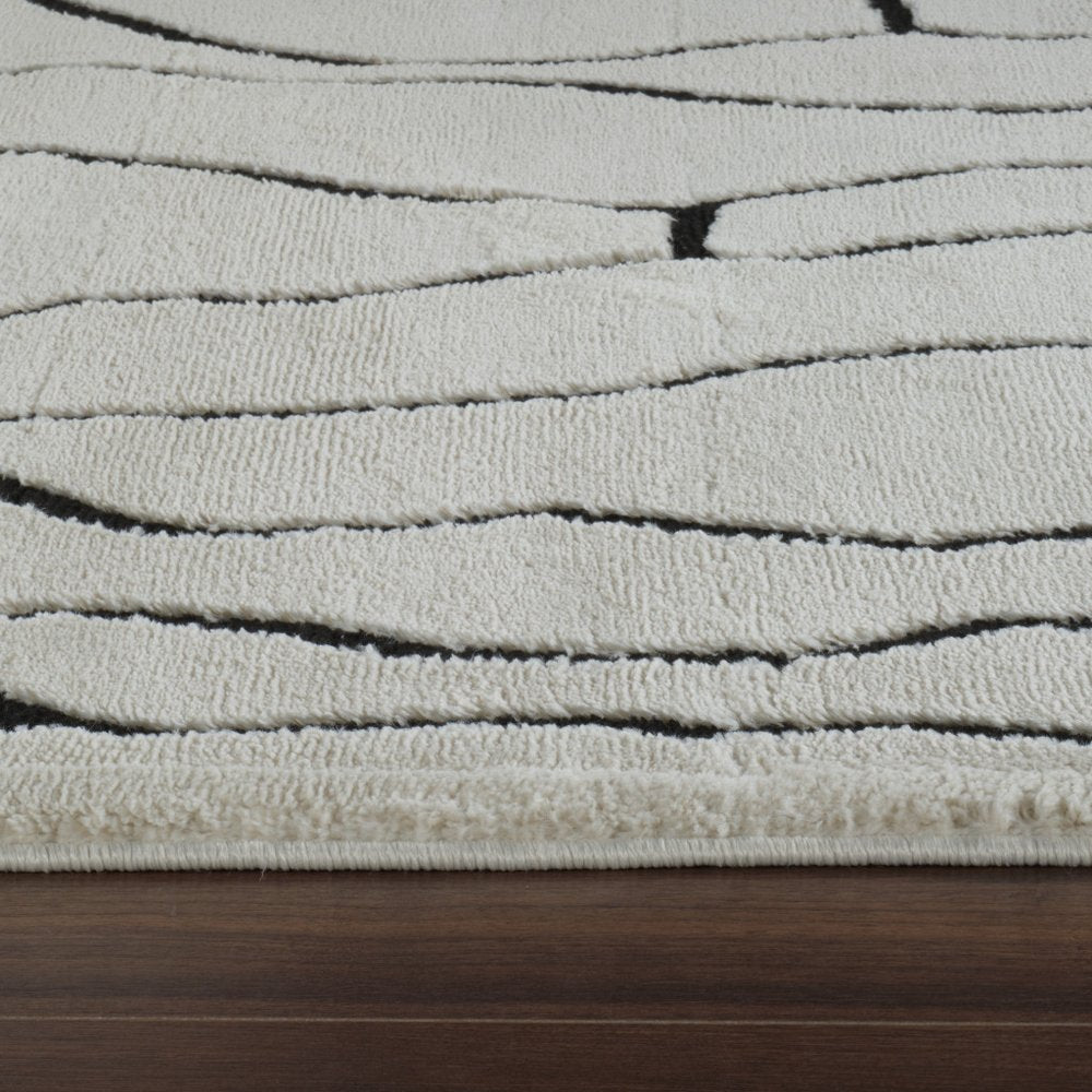 8' X 11' Cream and Black Abstract Distressed Area Rug