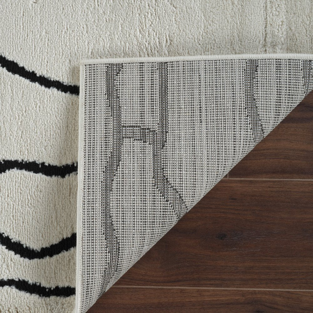 8' X 11' Cream and Black Abstract Distressed Area Rug