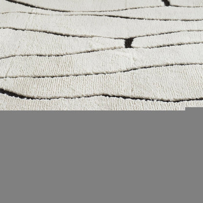 8' X 11' Cream and Black Abstract Distressed Area Rug