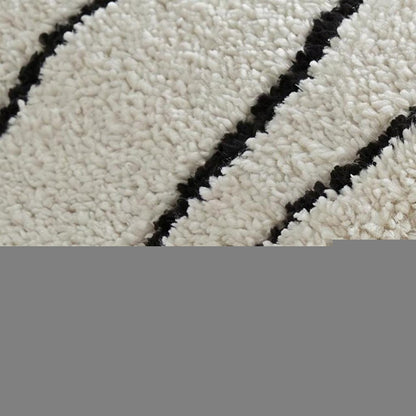 8' X 11' Cream and Black Abstract Distressed Area Rug