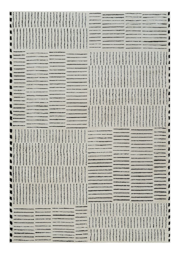 5' X 8' Cream and Black Abstract Distressed Area Rug