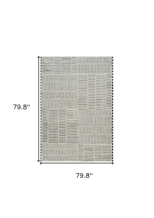 7' X 10' Cream and Black Abstract Distressed Area Rug