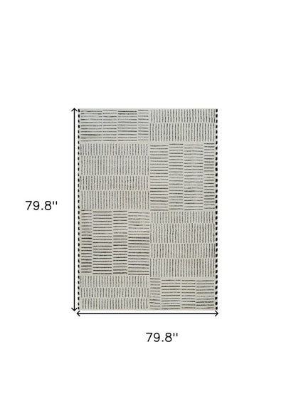 7' X 10' Cream and Black Abstract Distressed Area Rug
