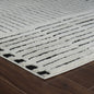 7' X 10' Cream and Black Abstract Distressed Area Rug