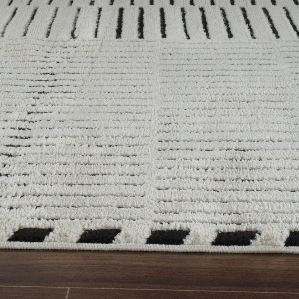 7' X 10' Cream and Black Abstract Distressed Area Rug