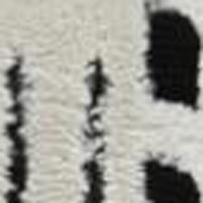 7' X 10' Cream and Black Abstract Distressed Area Rug