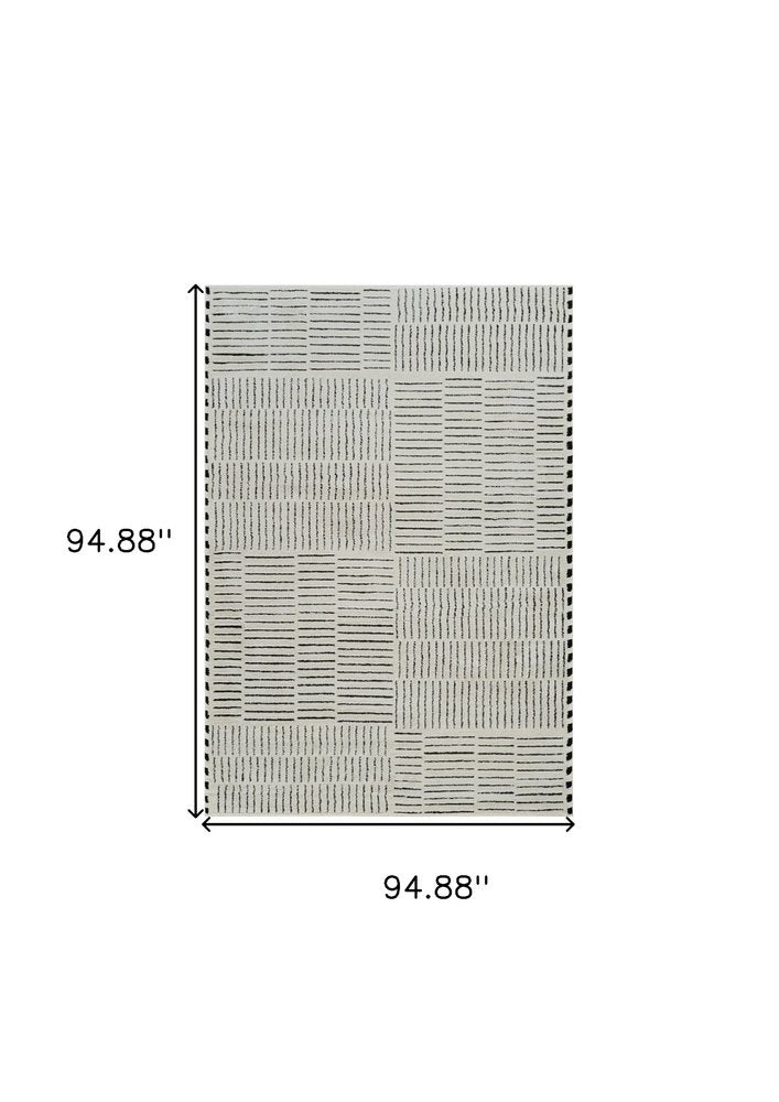 8' X 11' Cream and Black Abstract Distressed Area Rug