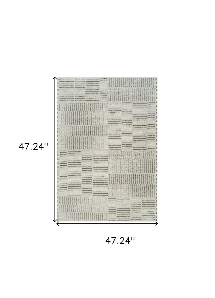 4' X 6' Cream and Green Abstract Distressed Area Rug