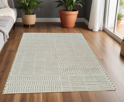 4' X 6' Cream and Green Abstract Distressed Area Rug