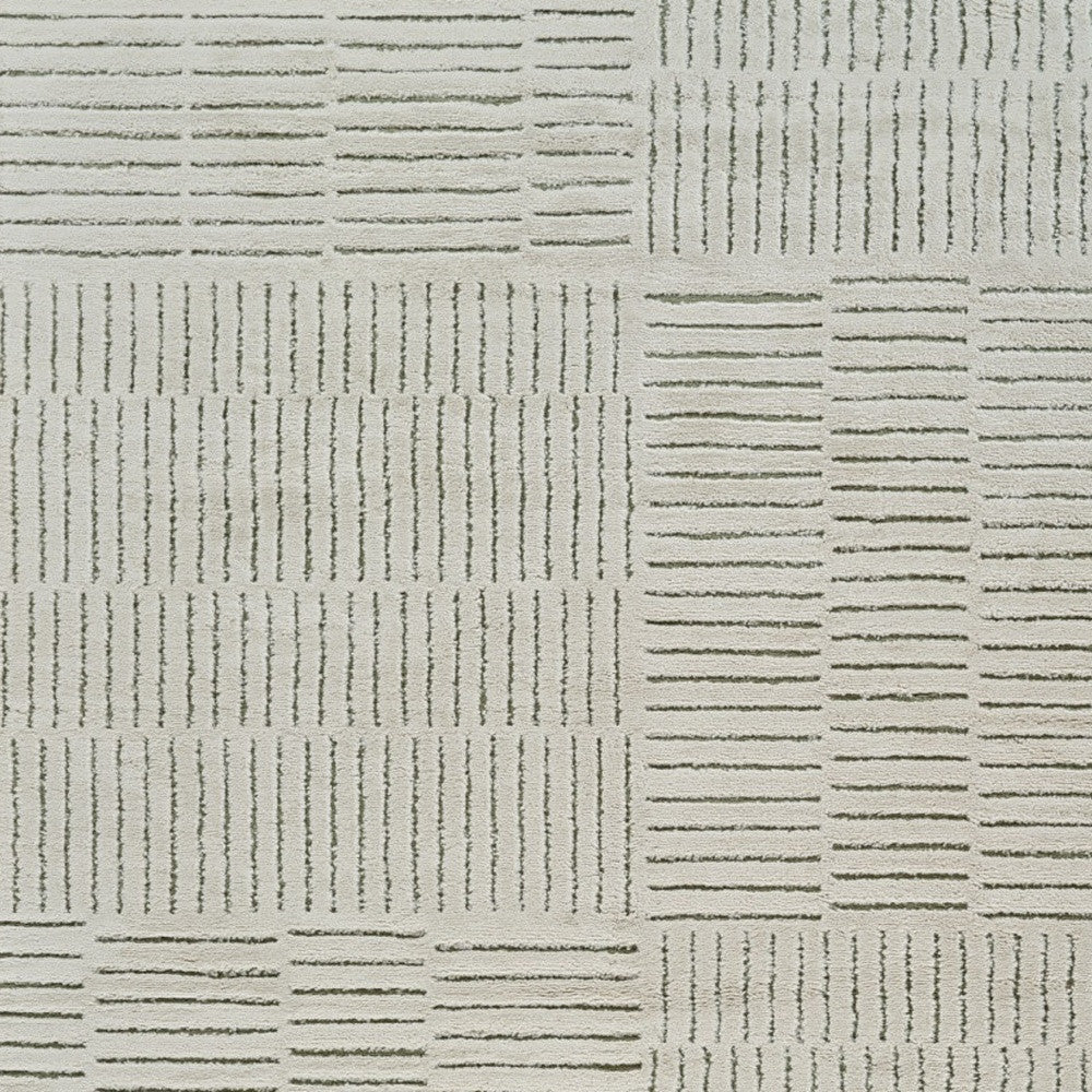 7' X 10' Cream and Green Abstract Distressed Area Rug