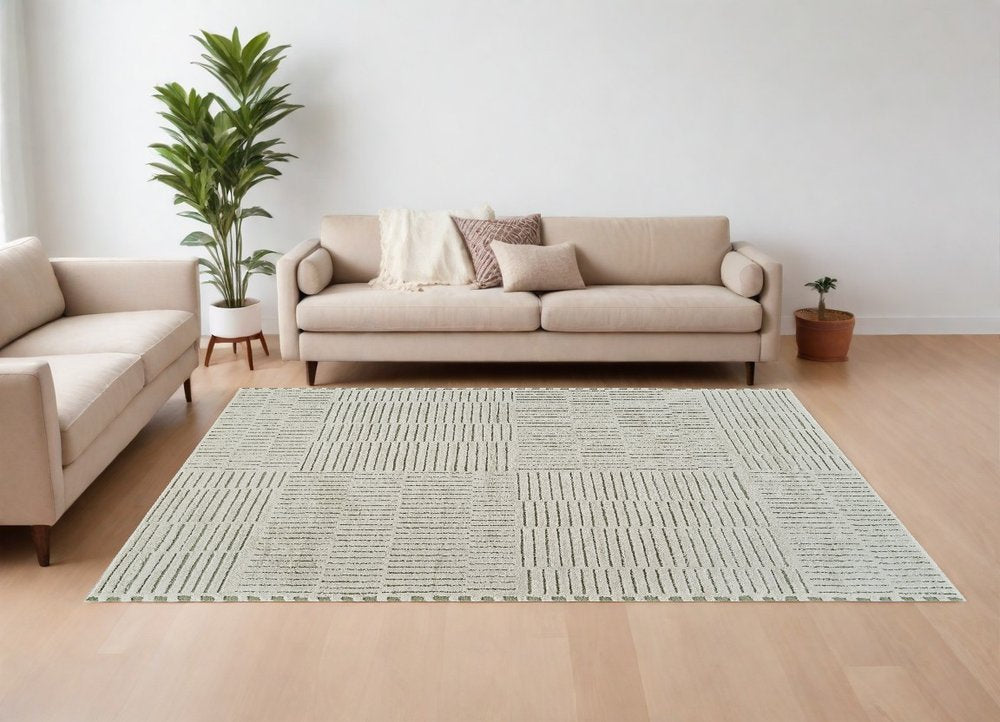 8' X 11' Cream And Green Abstract Distressed Area Rug