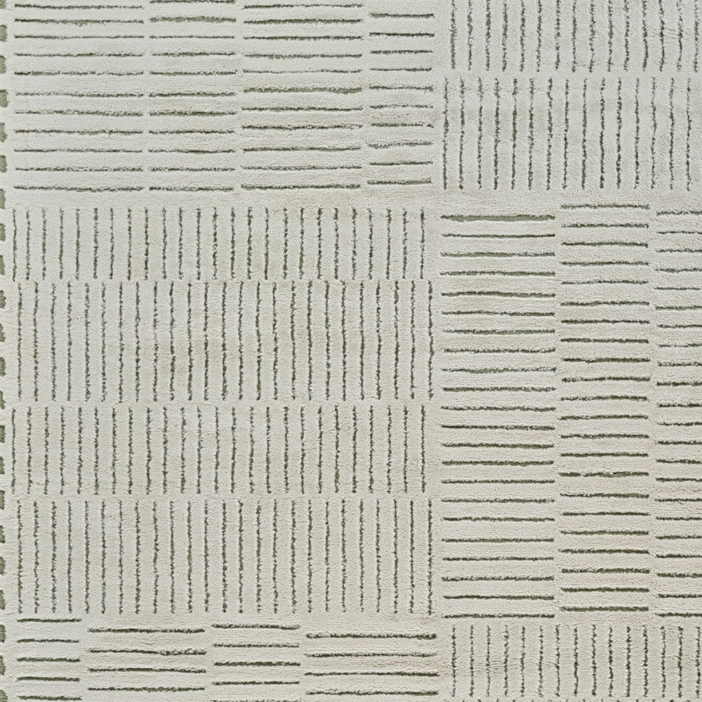 8' X 11' Cream and Green Abstract Distressed Area Rug