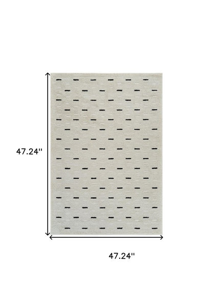 4' X 6' Cream and Black Abstract Distressed Area Rug