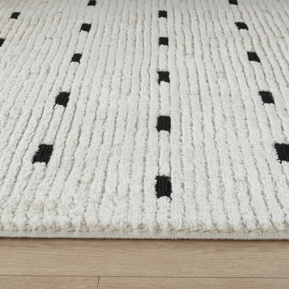 4' X 6' Cream and Black Abstract Distressed Area Rug
