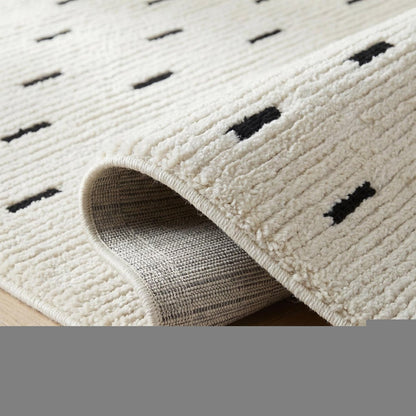 7' X 10' Cream and Black Abstract Distressed Area Rug