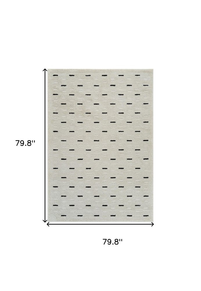 7' X 10' Cream and Black Abstract Distressed Area Rug