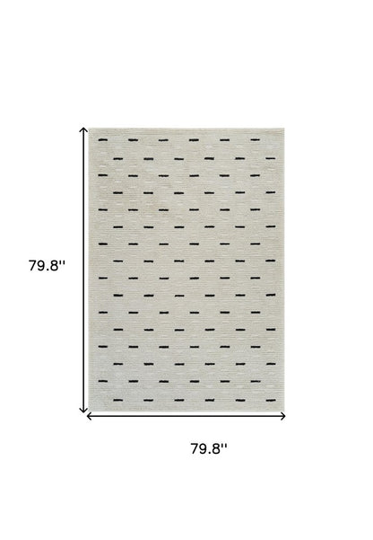 7' X 10' Cream and Black Abstract Distressed Area Rug