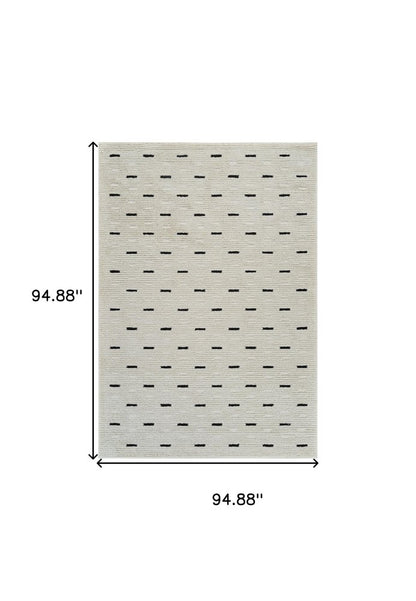 8' X 11' Cream and Black Abstract Distressed Area Rug