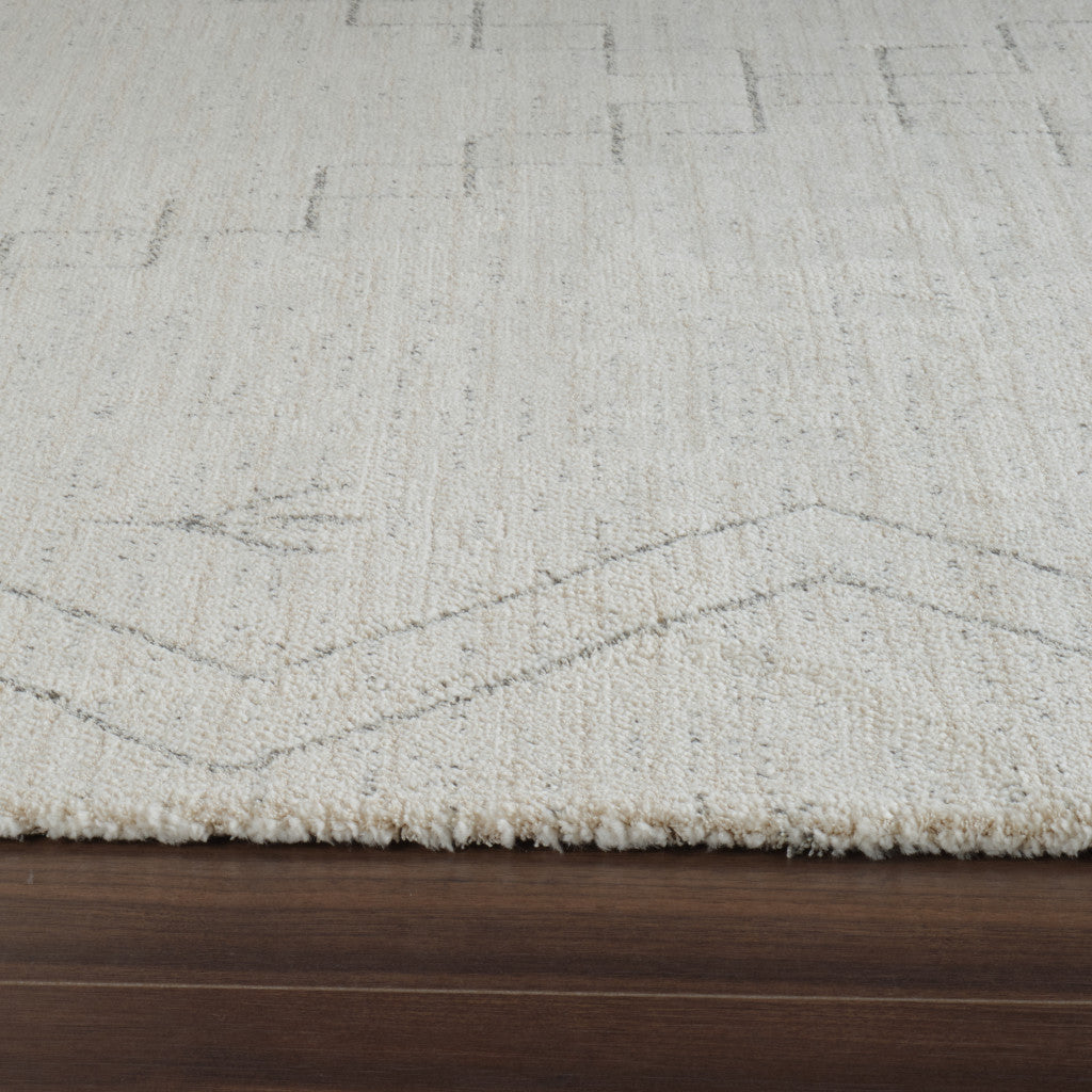 8' Cream and Beige Abstract Distressed Area Rug