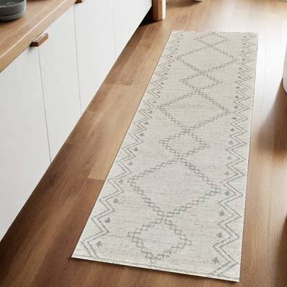 8' Cream and Beige Abstract Distressed Area Rug